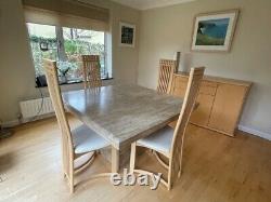 Square marble dining table and four recently re-upholstered chairs