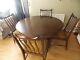 Stag Dining Table And 4 Upholstered Chairs