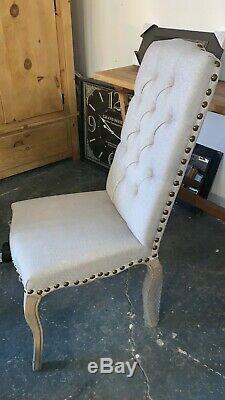 Upholstered dining chairs with buttons