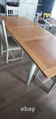 White and solid wood extendable dining table and 4 upholstered chair set
