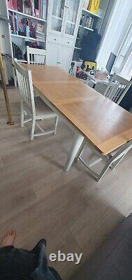 White and solid wood extendable dining table and 4 upholstered chair set